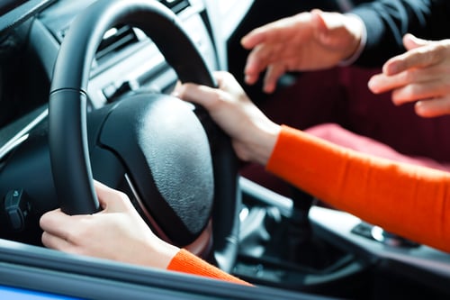 woman driver with instructor