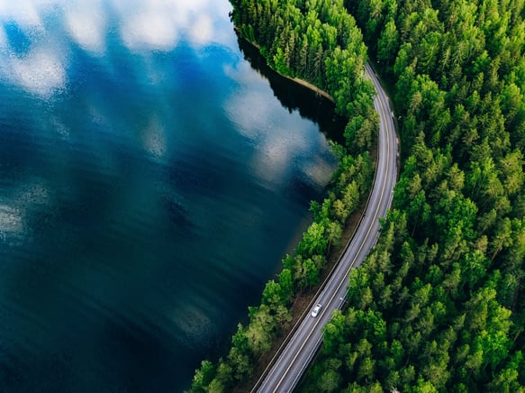 Aerial view of road along side the water
