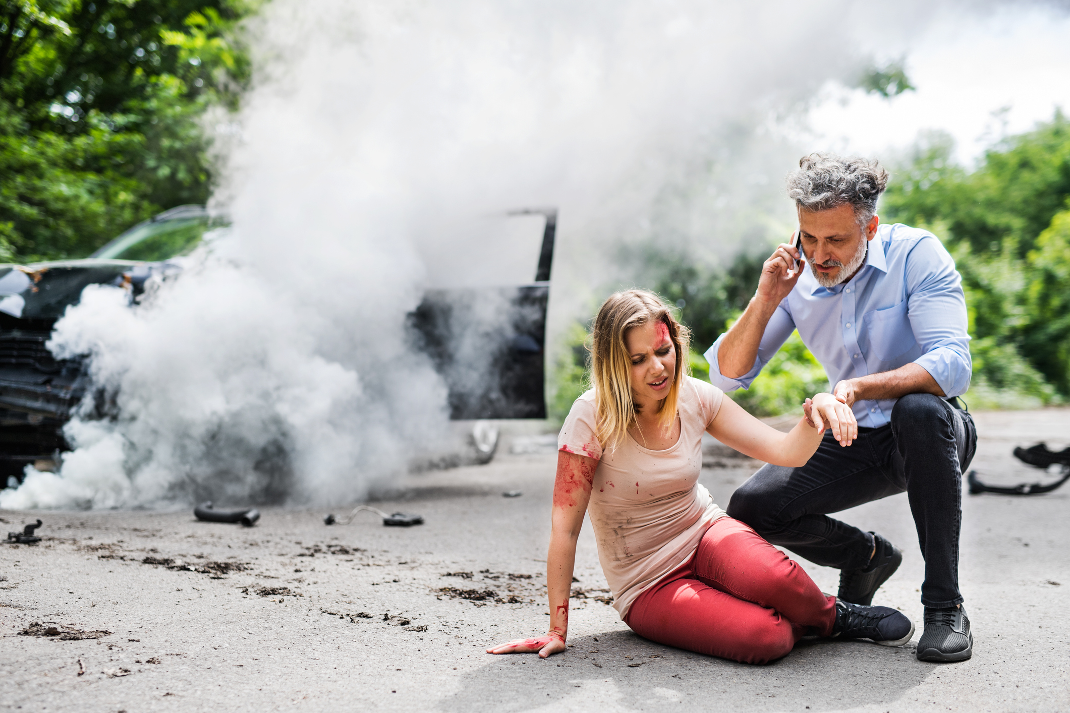  woman by the car after an accident