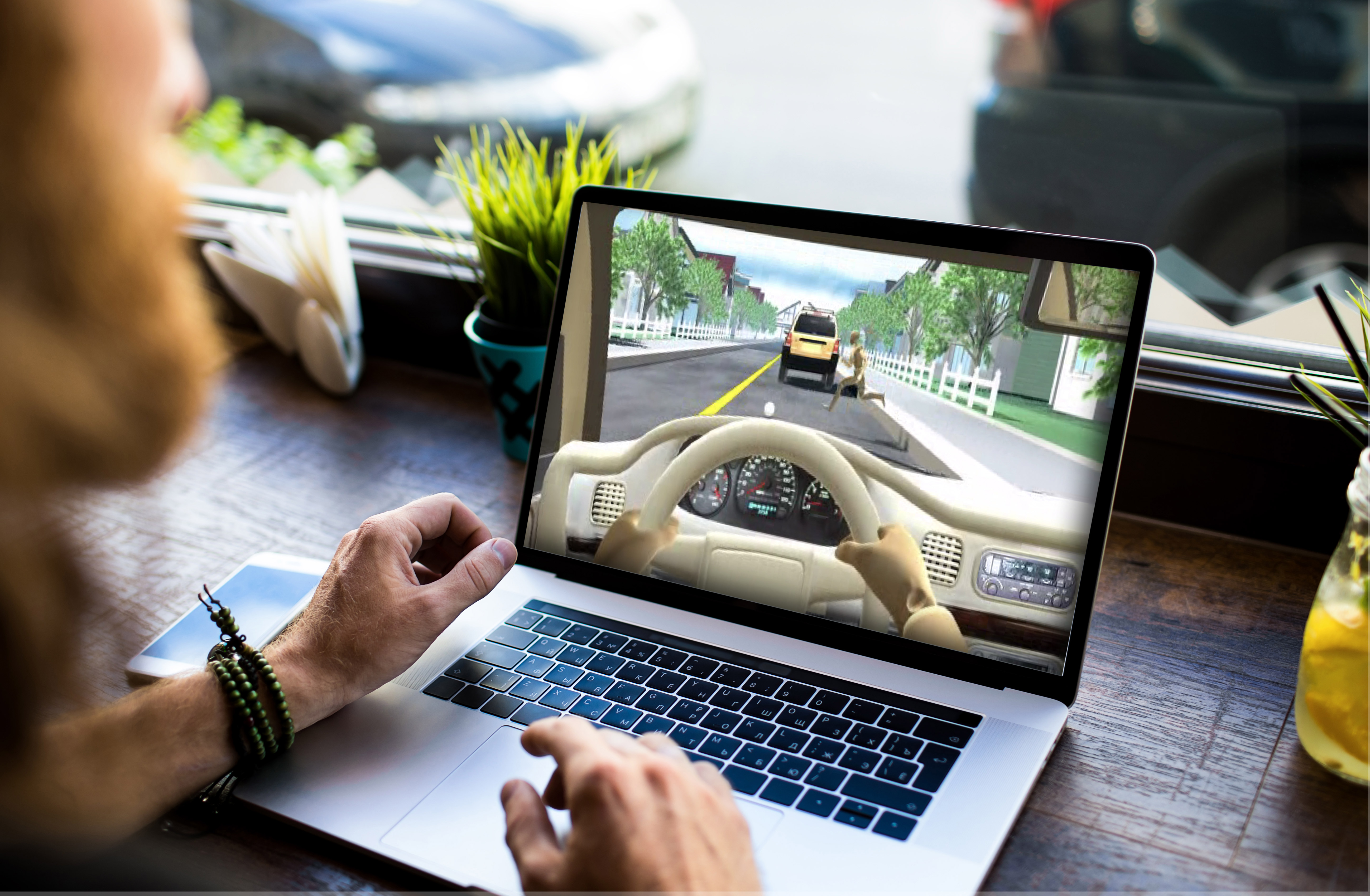Man with beard using laptop